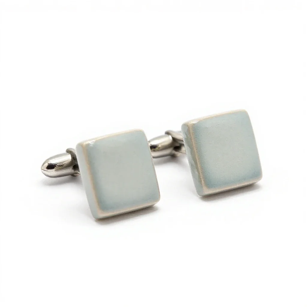 Pair of cufflinks isolated on a white background