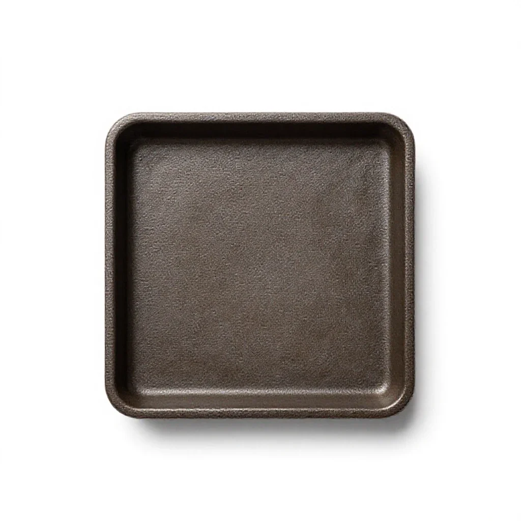 Trivet in cast iron isolated on a white background