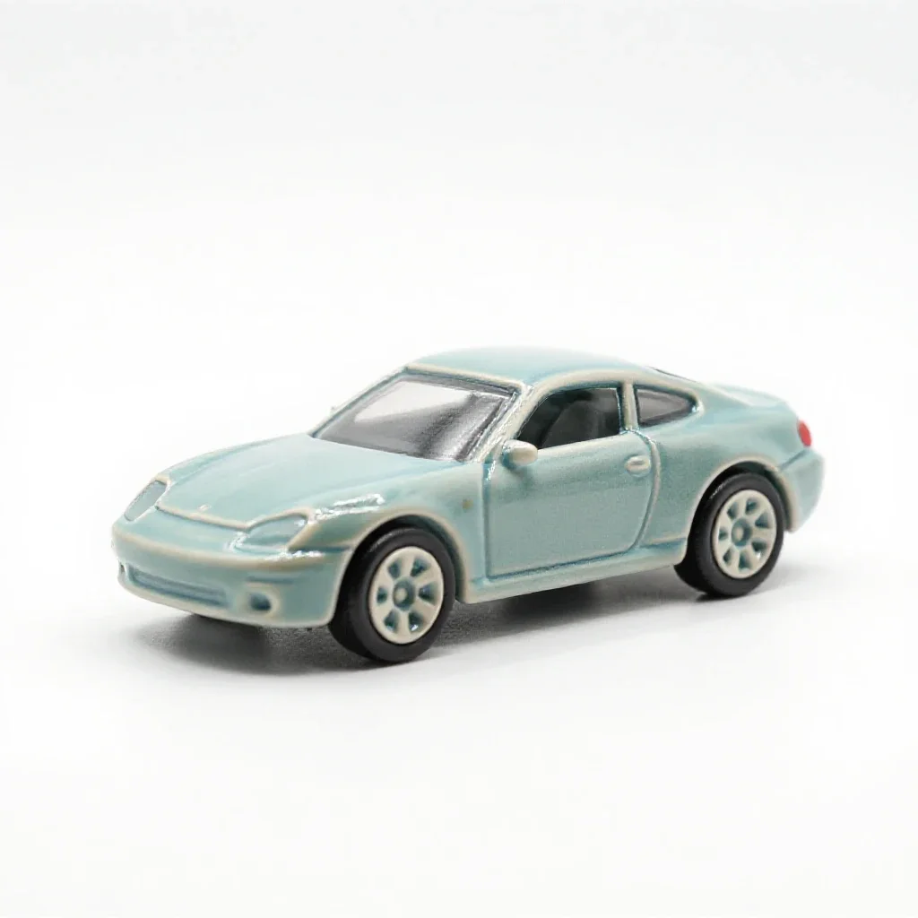 Die-cast toy car isolated on a white background