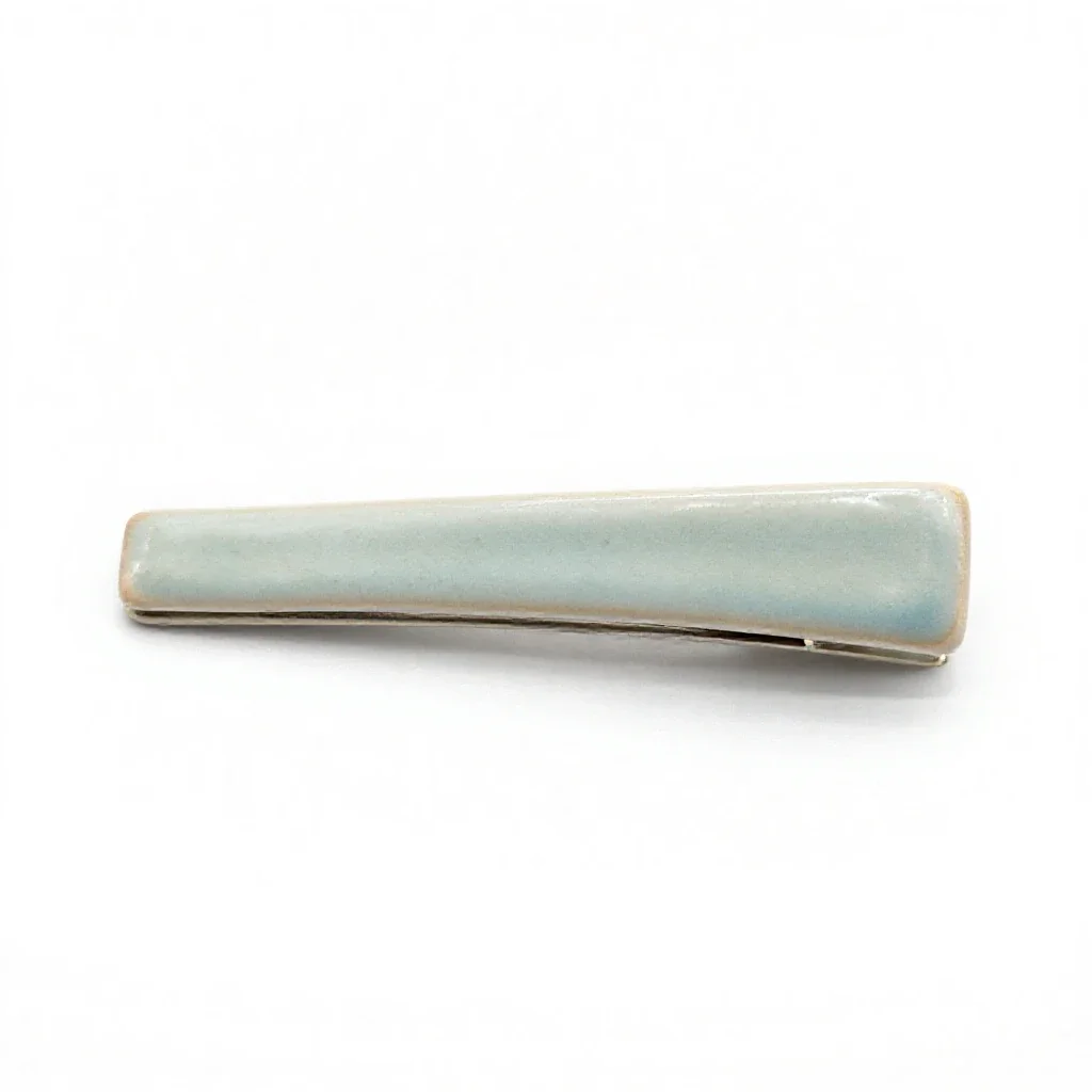 Tie clip isolated on a white background