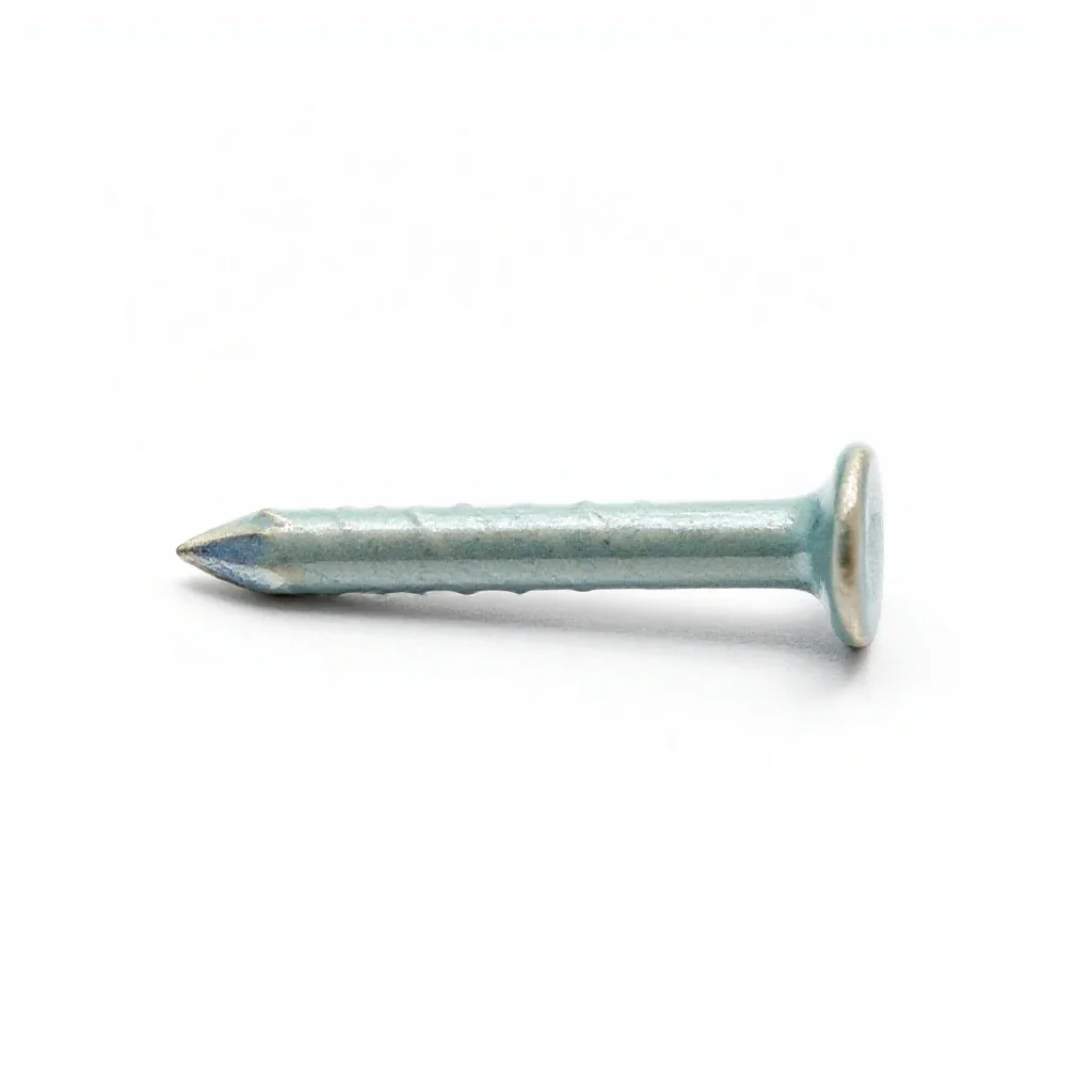 Fourpenny nail isolated on a white background