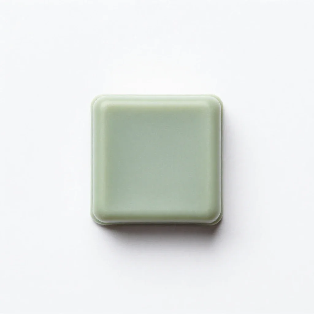 Surf wax bar isolated on a white background