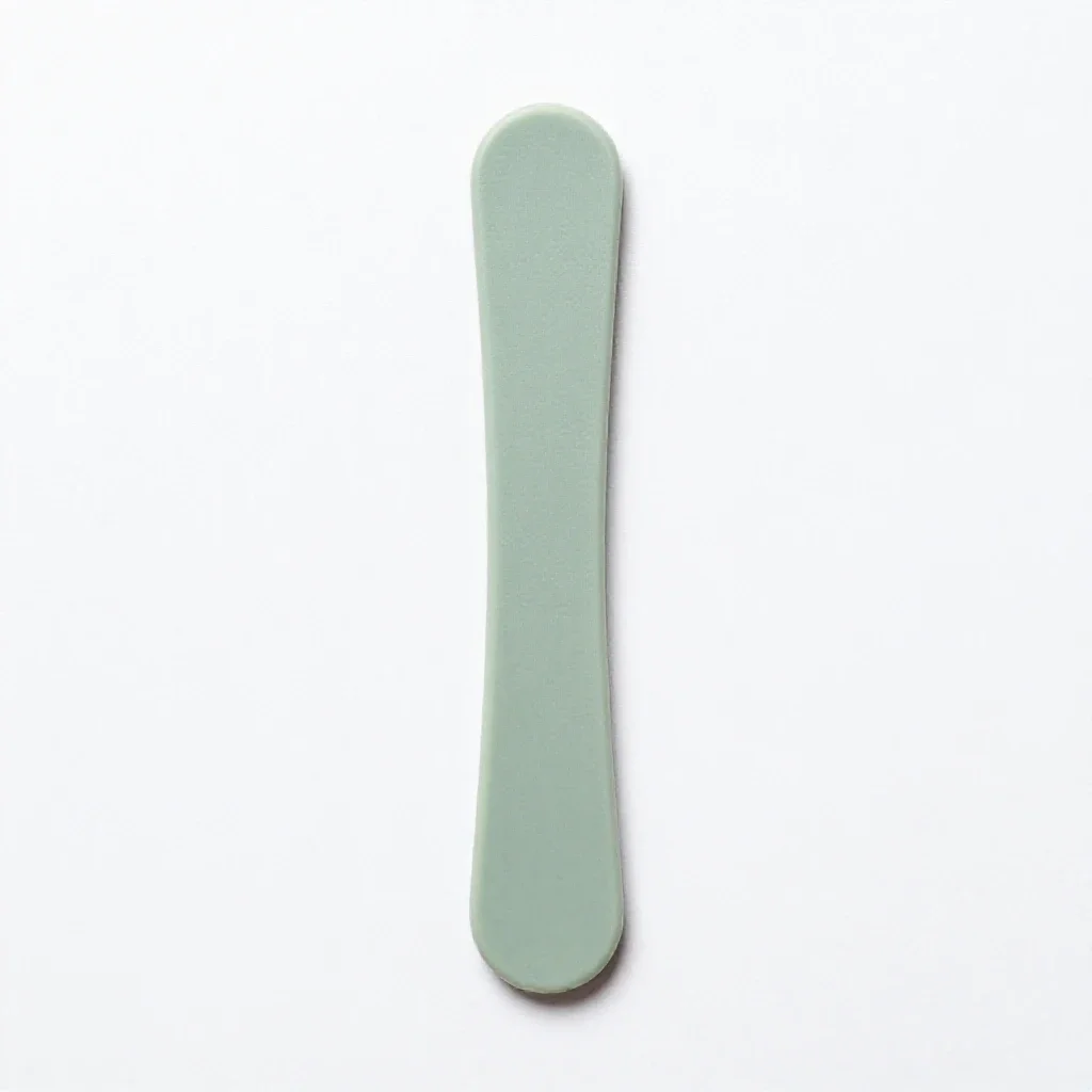Tongue scraper isolated on a white background