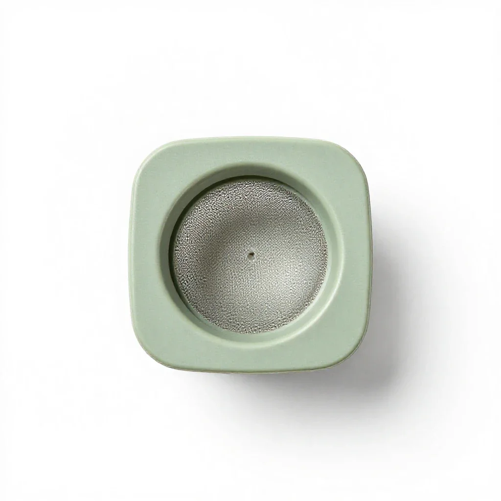 Tea-strainer isolated on a white background