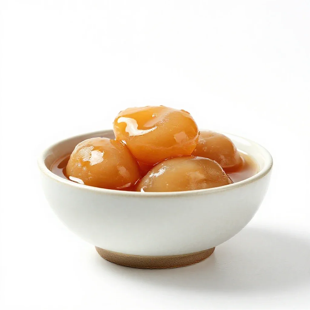 Baba au rhum isolated on a white background
