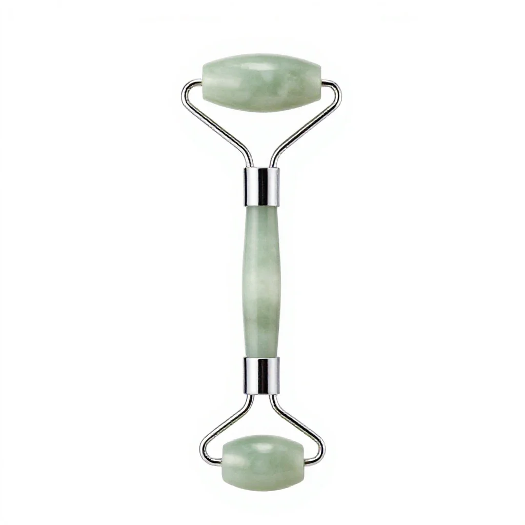 Jade facial roller isolated on a white background
