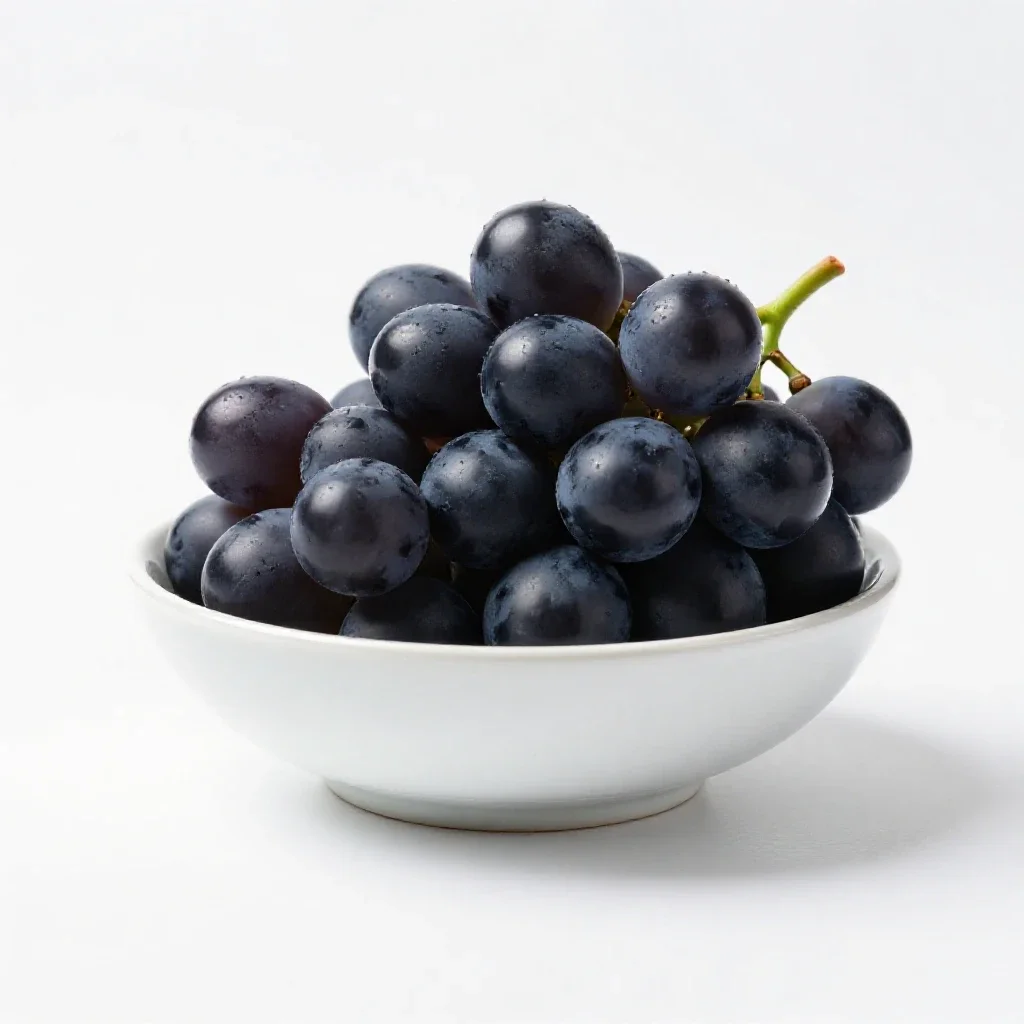 Bunch of black grapes isolated on a white background