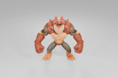 Muscular, cartoonish action figure with orange skin and lizard-like features 3D model preview