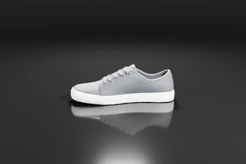 Photograph of a grey sneaker with a white sole 3D model preview
