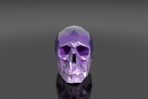 Intricately faceted geode-cut gemstone skull, each facet a distinct flat 3D model preview