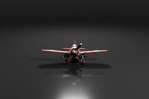 Small red and black airplane on a black background 3D model preview