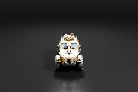 Photograph of a military vehicle, specifically a Humvee, on a black background 3D model preview