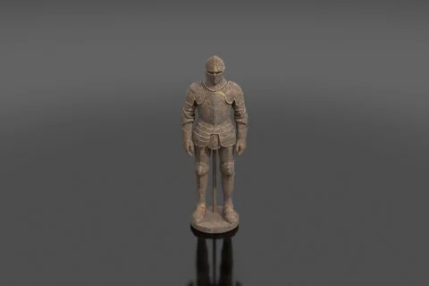Photograph of a small figurine of a knight 3D model preview