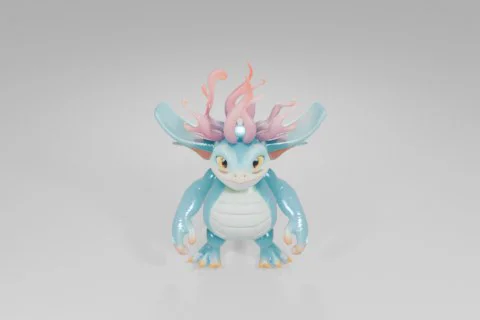 Playful cartoon dragon-like creature with turquoise scales, a cream-colored 3D model preview