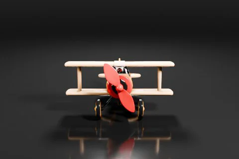 Photograph of a small toy airplane 3D model preview
