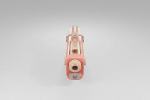 Stylized toy blaster features a chunky red and beige body with playful 3D model preview