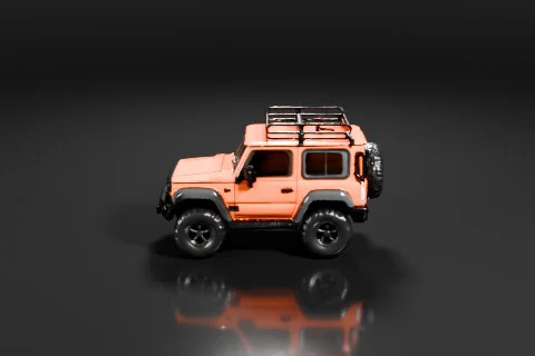Compact orange off-road vehicle with large rugged tires, a black roof rack 3D model preview